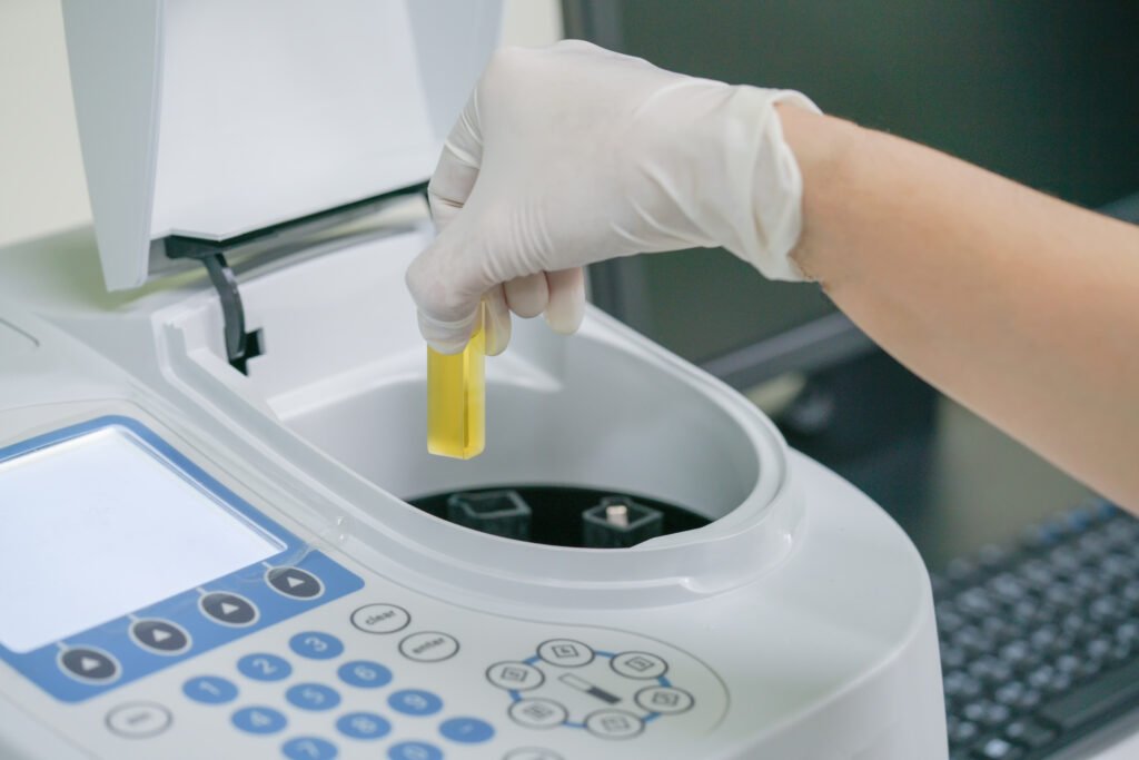 Scientist working at water quality test use by Spectrophotometer in the laboratory